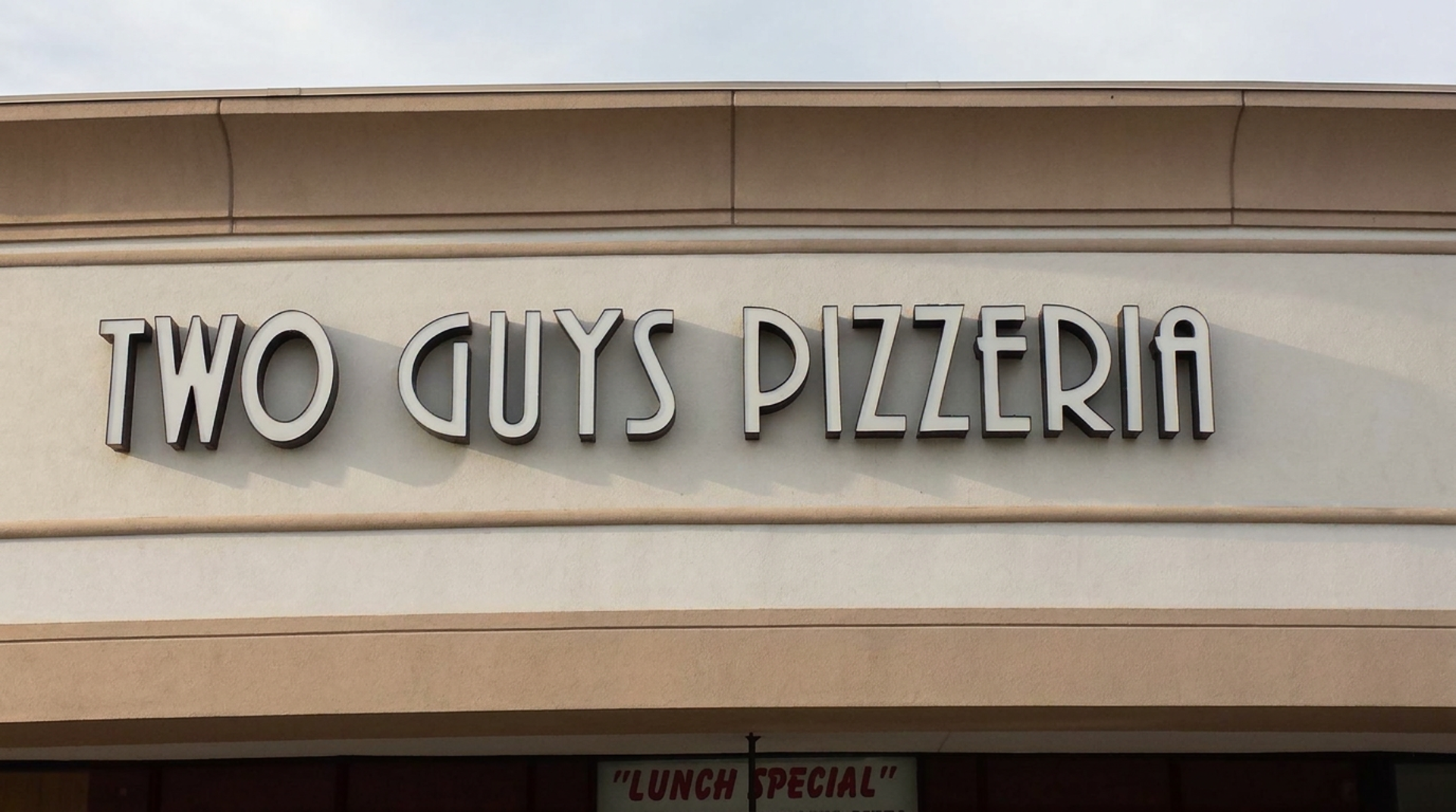 Two guys, a hot oven, big slices